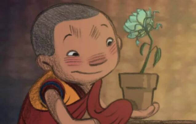 dechen-monaco-buddista-con-fiore-del-cortometraggio-Smettere-di-controllare